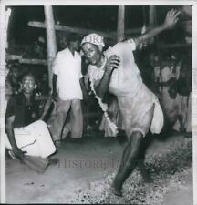1959 Press Photo Follower of Shiah Muslim sect races over coals, Pakistan